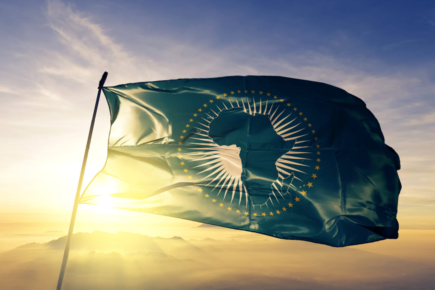 photo of African Union flag with sun behind