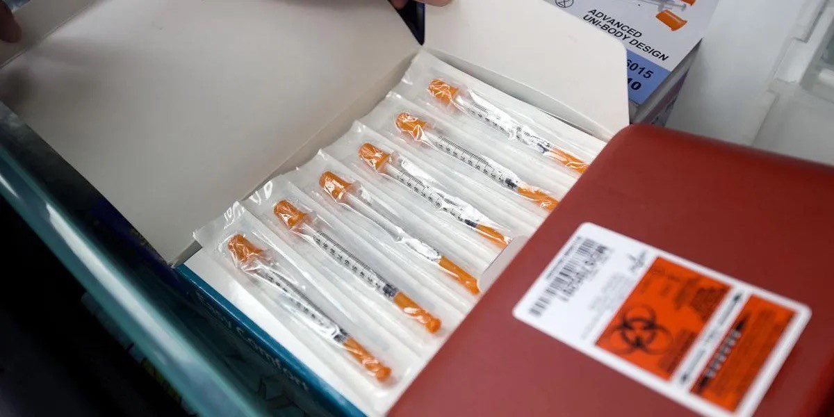 photo of Naloxone syringes in a box. Image courtesy of Challenges INC SC.