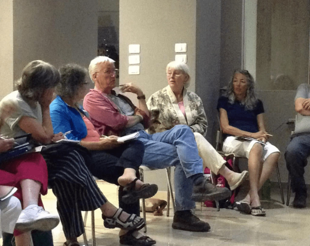 Group of older adults sitting in circle