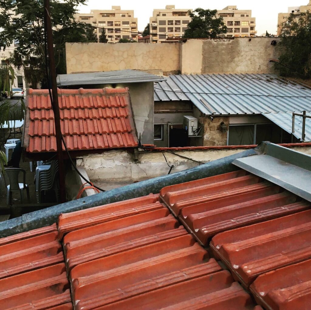 roof tops Palestine with apartment buildings in the distance