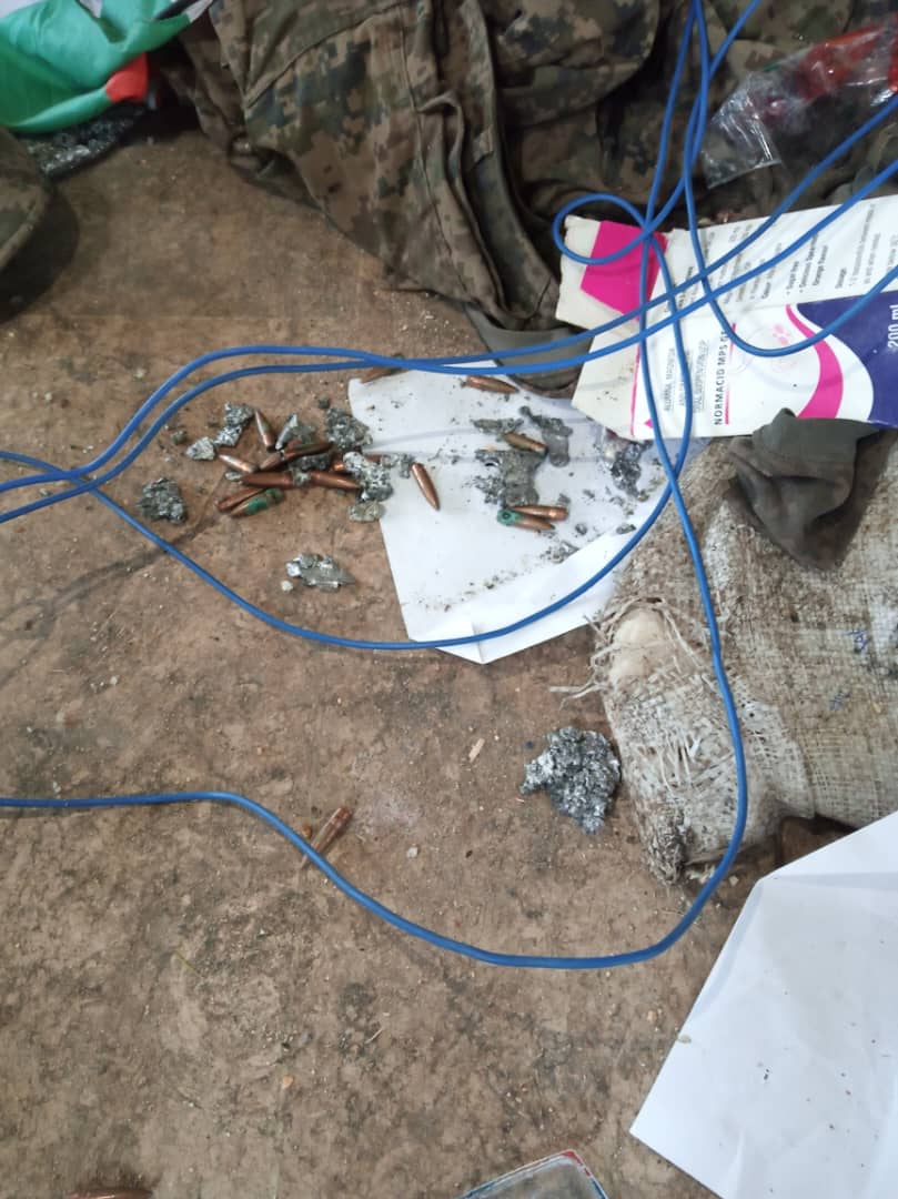 Bullets, wires, and clothing left on the floor of the museum.