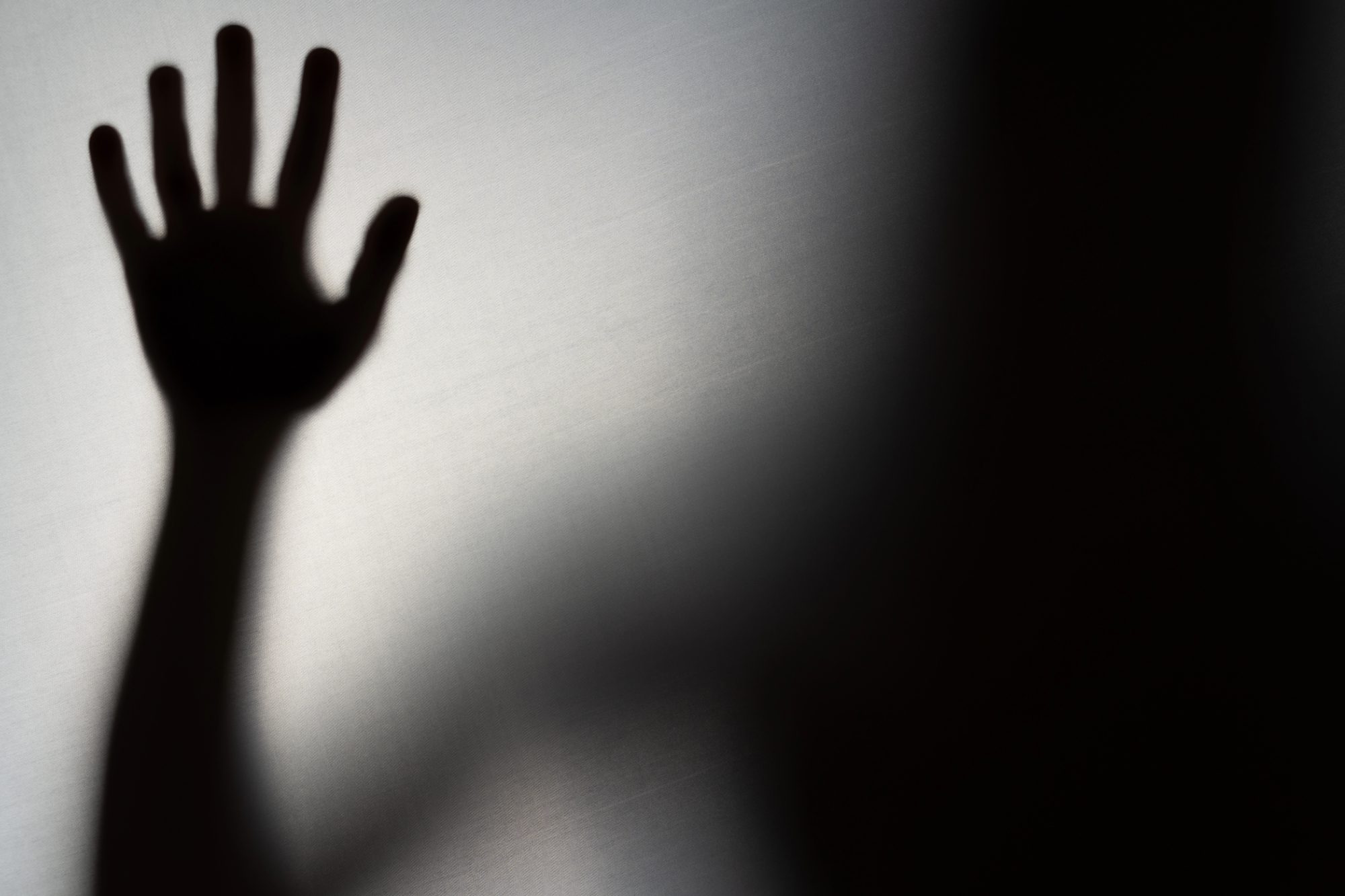 Blurred Woman's hand shadow