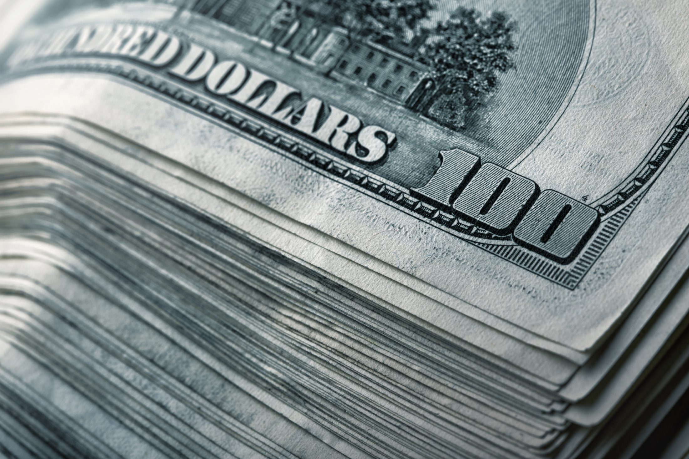 Stack of hundred dollar bills