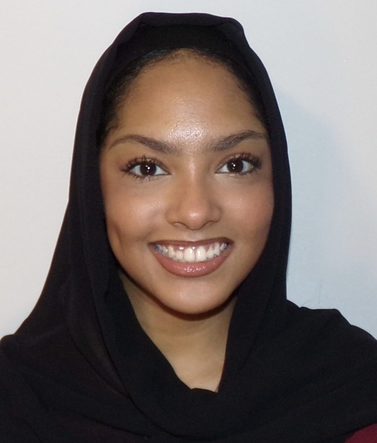 photo headshot woman with black scarf