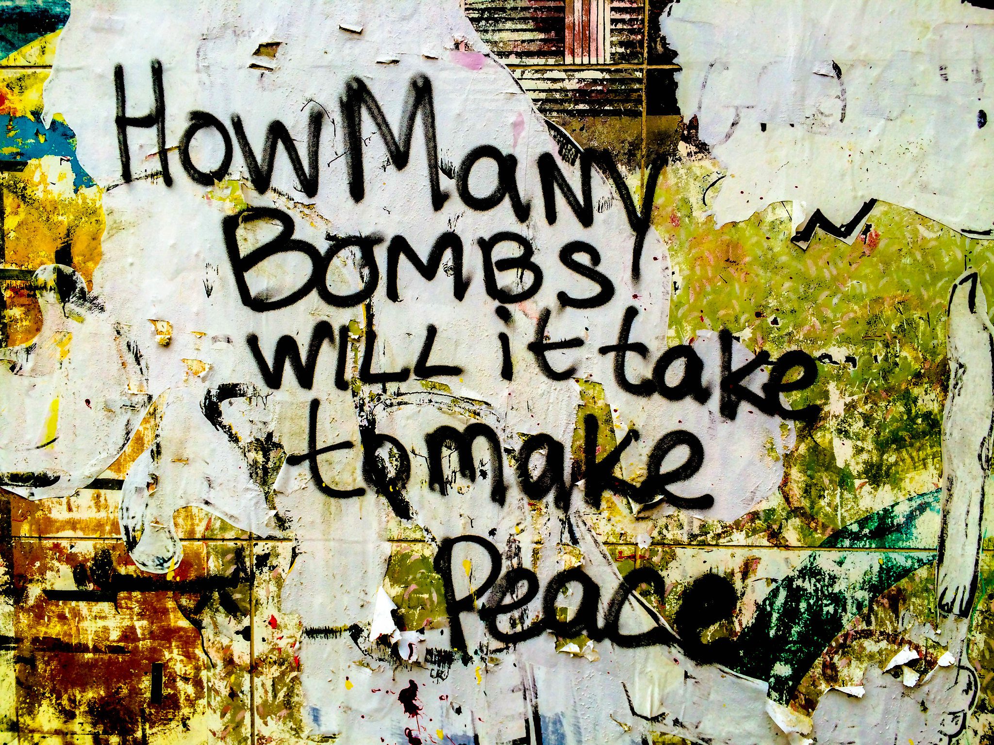 graffiti "how many bombs will it take to make peace?"